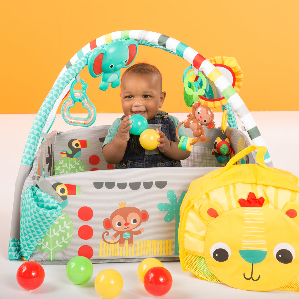 baby boy in a play gym
